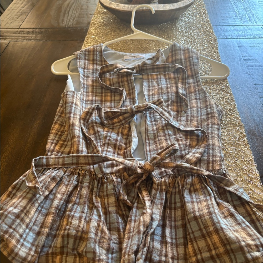 Super cute plaid tank top with bow accents by Peppermayo! In EUC!